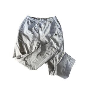 Nike sportswear tech essentials commuter pants in light grey